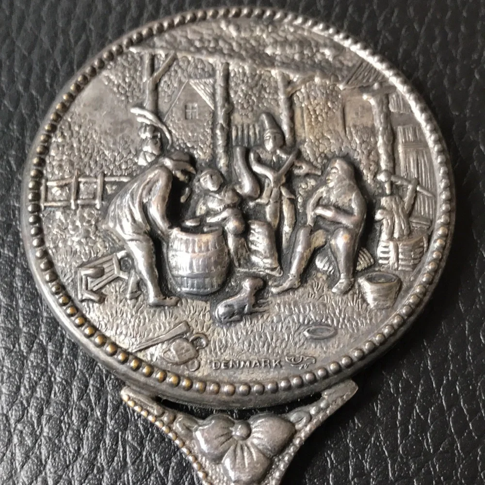 Antique petite hand mirror